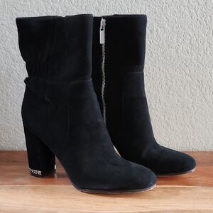 Michael Kors -Elegant Black Suede Boots with Silver Chain Logo Heel Accent.